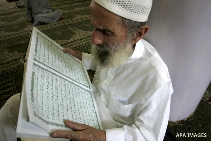A Palestinian Muslim reads the holy Koran at a Mosque in Rafah, southern Gaza Strip on Aug. 9, 2011. Muslims around the world refrain from eating, drinking and sexual intercourse from dawn till dusk during Ramadan, the h...