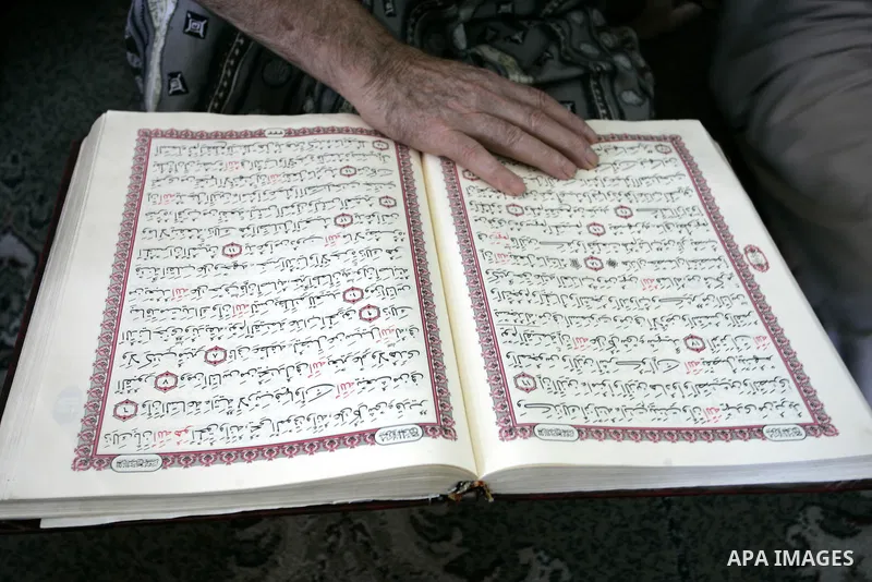 A Palestinian Muslim reads the holy Koran at a Mosque in Rafah, southern Gaza Strip on Aug. 9, 2011. Muslims around the world refrain from eating, drinking and sexual intercourse from dawn till dusk during Ramadan, the h...