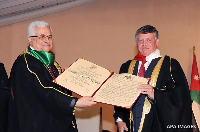 Palestinian President Mahmoud Abbas (Abu Mazen) during the granting of his Majesty King Abdullah II an honorary doctorate in Amman on Aug. 9, 2011. Photo by Thaer Ganaim