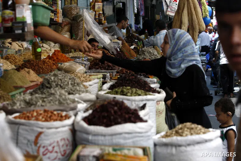 Palestinians shop for food at a market in Gaza city on Aug. 10, 2011. Muslims around the world abstain from eating, drinking and conducting sexual relations from sunrise to sunset during Ramadan, the holiest month in the...