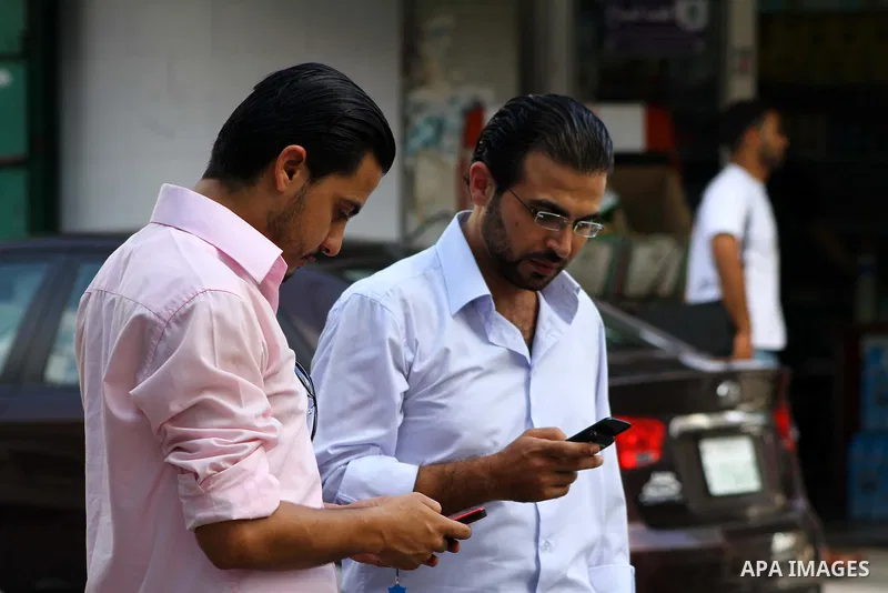 Palestinians try to call each other through the Palestinian communication services (Jawwal) but there are problems in communication because of the damage of Israeli attacks, yesterday evening in Gaza city on Aug. 10, 201...