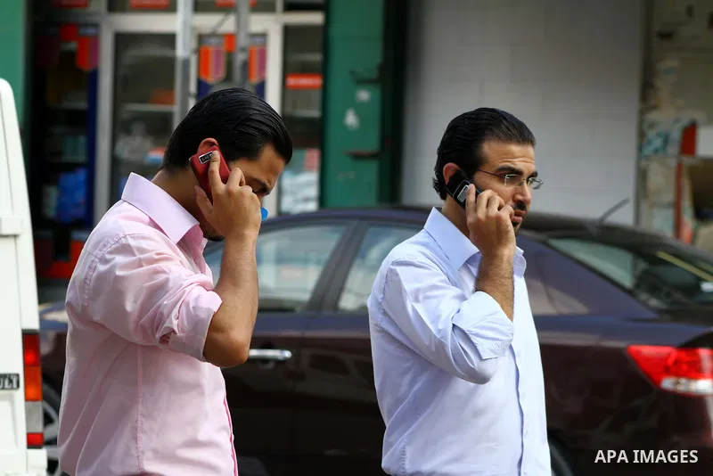 Palestinians try to call each other through the Palestinian communication services (Jawwal) but there are problems in communication because of the damage of Israeli attacks, yesterday evening in Gaza city on Aug. 10, 201...