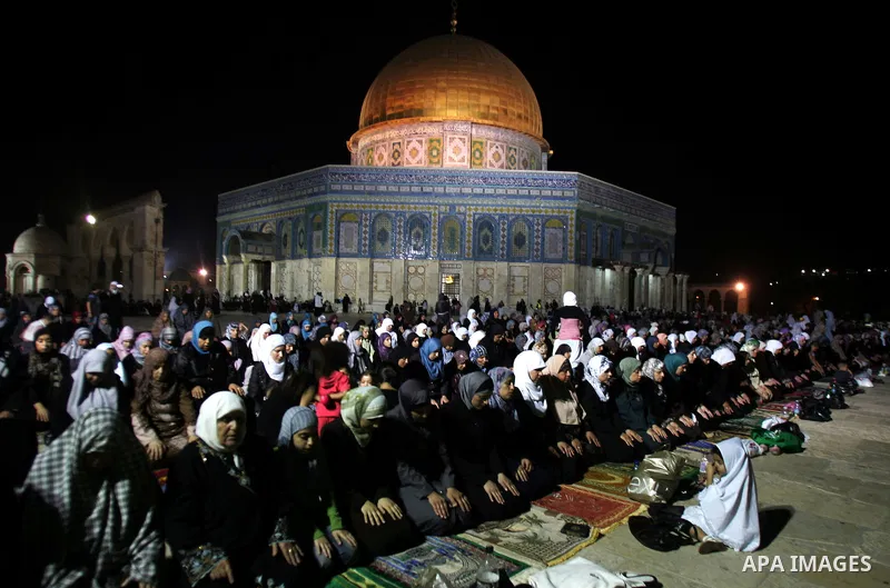 Palestinian Muslims perform al-Taraweeh prayer on the night of the tenth of the holiest month of Ramadan at Al Aqsa Mosque in the old city of Jerusalme on Aug. 10, 2011. Muslims around the world are observing the holy fa...