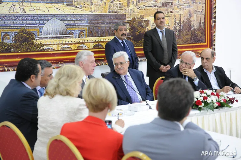Palestinian president Mahmud Abbas meets with 25 visiting representatives from the US congress in the West Bank city of Ramallah on August 11, 2011. Photo by THAER GANAIM