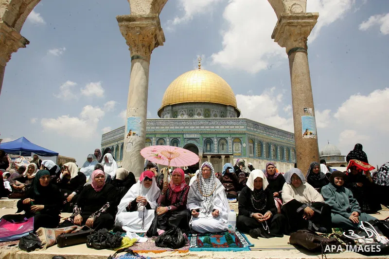 Palestinians gather for prayers at the Al Aqsa Mosque in Jerusalem, on the second Friday of the Muslim holy month of Ramadan, Friday Aug. 12, 2011. Muslims around the world are observing the holy fasting month of Ramadan...