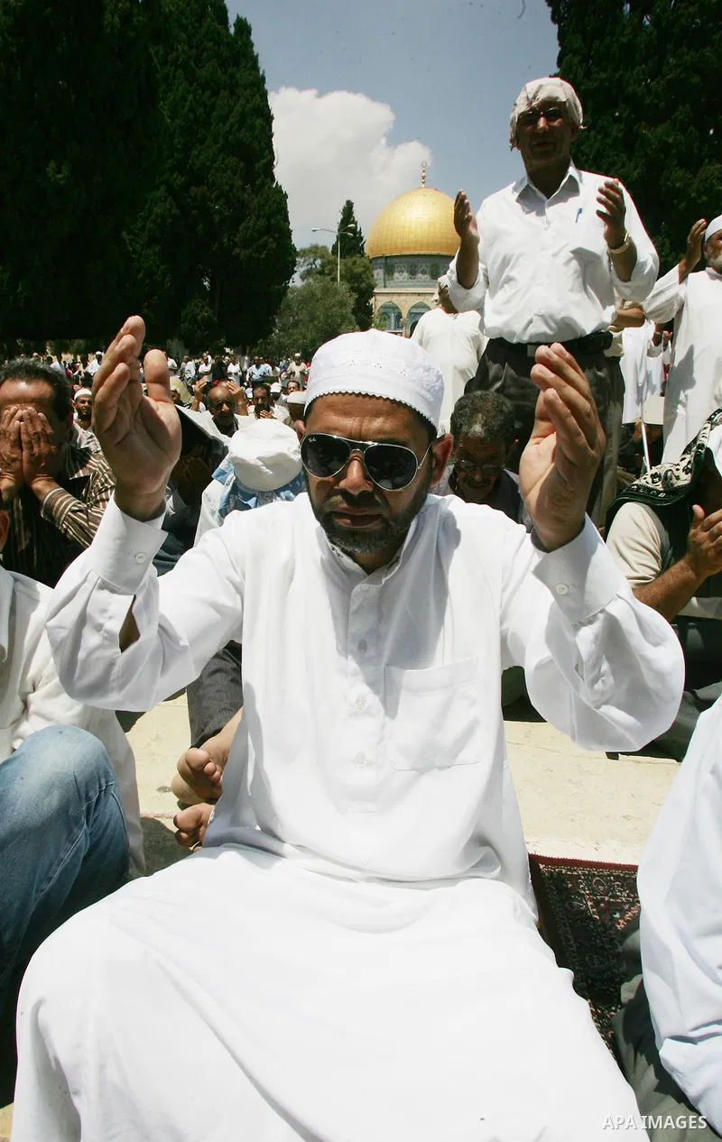 Palestinians gather for prayers at the Al Aqsa Mosque in Jerusalem, on the second Friday of the Muslim holy month of Ramadan, Friday Aug. 12, 2011. Muslims around the world are observing the holy fasting month of Ramadan...