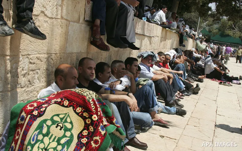 Palestinians gather for prayers at the Al Aqsa Mosque in Jerusalem, on the second Friday of the Muslim holy month of Ramadan, Friday Aug. 12, 2011. Muslims around the world are observing the holy fasting month of Ramadan...