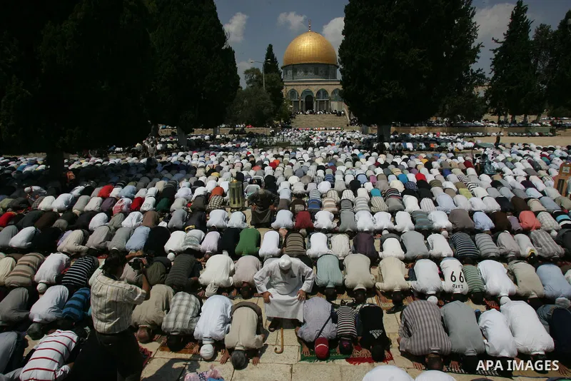 Palestinians pray at the Al Aqsa Mosque in Jerusalem, on the second Friday of the Muslim holy month of Ramadan, Friday Aug. 12, 2011. Muslims around the world are observing the holy fasting month of Ramadan where they re...