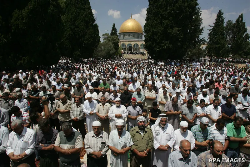 Palestinians pray at the Al Aqsa Mosque in Jerusalem, on the second Friday of the Muslim holy month of Ramadan, Friday Aug. 12, 2011. Muslims around the world are observing the holy fasting month of Ramadan where they re...