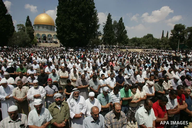 Palestinians pray at the Al Aqsa Mosque in Jerusalem, on the second Friday of the Muslim holy month of Ramadan, Friday Aug. 12, 2011. Muslims around the world are observing the holy fasting month of Ramadan where they re...