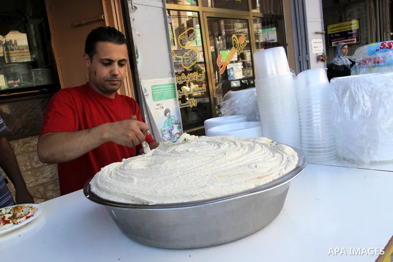 A Palestinian vendor sells chickpeas in his shop in Gaza City on Aug. 15, 2011. Muslims around the world abstain from eating, drinking and conducting sexual relations from sunrise to sunset during Ramadan, the holiest mo...
