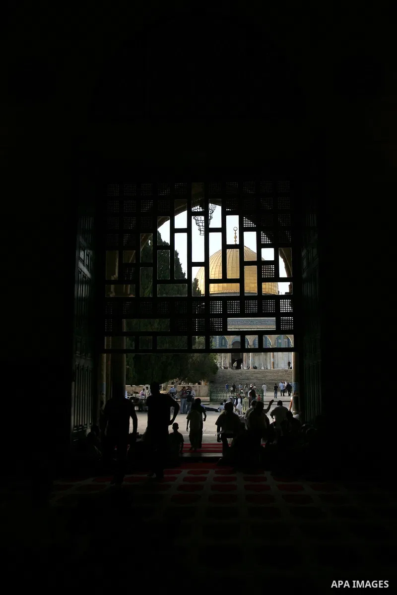Palestinian Muslims rest as others pray and read the holy Koran in al-Aqsa Mosque, in Jerusalem's Old City on Aug. 14, 2011. Muslims around the world are observing the holy fasting month of Ramadan in which they refrain...