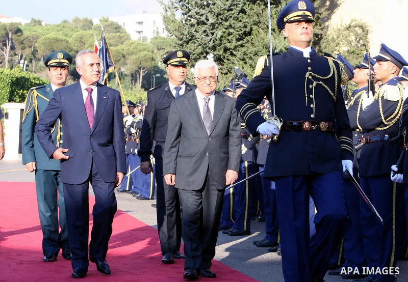 Palestinian President Mahmoud Abbas meets with Lebanon's President Michel Suleiman during an official welcoming ceremony upon Abbas' arrival at the Presidential Palace in Baabda, east of Beirut, August 16, 2011. Photo by...
