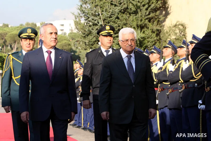Palestinian President Mahmoud Abbas meets with Lebanon's President Michel Suleiman during an official welcoming ceremony upon Abbas' arrival at the Presidential Palace in Baabda, east of Beirut, August 16, 2011. Photo by...