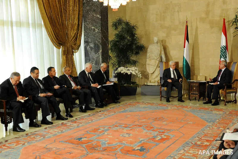 Palestinian President Mahmoud Abbas meets with Lebanon's President Michel Suleiman during an official welcoming ceremony upon Abbas' arrival at the Presidential Palace in Baabda, east of Beirut, August 16, 2011. Photo by...
