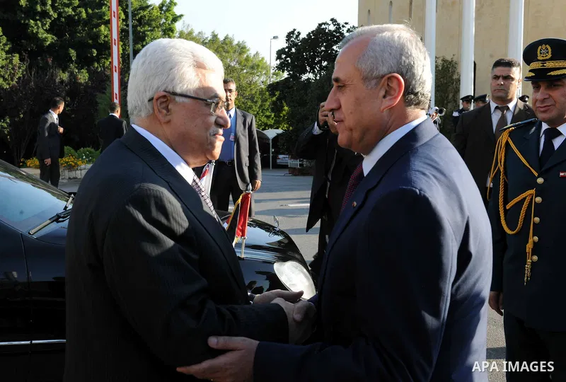 Palestinian President Mahmoud Abbas meets with Lebanon's President Michel Suleiman during an official welcoming ceremony upon Abbas' arrival at the Presidential Palace in Baabda, east of Beirut, August 16, 2011. Photo by...