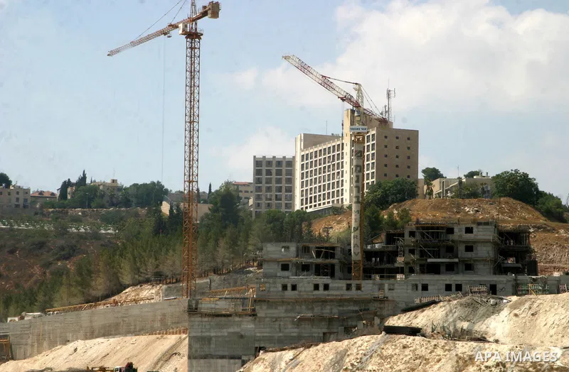 A picture shows the construction site in the Jewish settlement of Harmoun Hanatseev in east Jerusalem on August 16,2011. Photo by Mahfouz Abu Turk