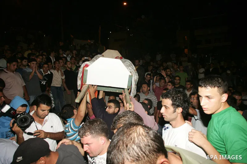 Relatives and friends of the Palestinian Amin Taleb Dabash, 32, carry his body during his funeral in the village of Sur Baher in east Jerusalem on August 17,2011. Dabash was killed after an Israeli military jeep hit him...