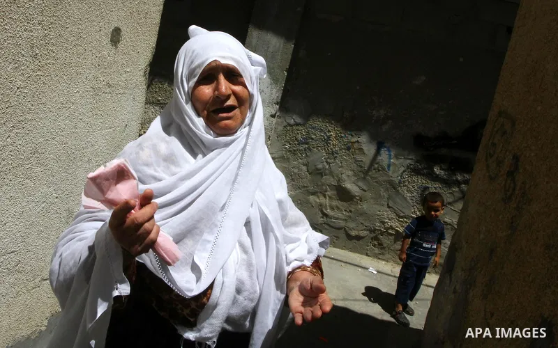 Palestinian women mourn during the funeral of Saed al Majdalawai in Nusseirat refugee camp in the central Gaza Strip on August 17, 2011. Israeli forces shot dead al Majdalawai near the border fence with Israel. An Israel...