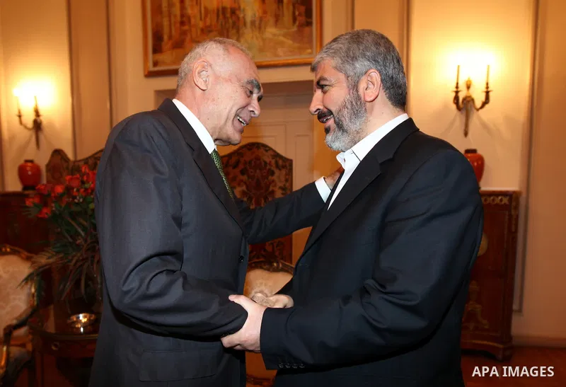 Palestinian Hamas leader Khaled Meshaal meets with the Minister of Foreign Affairs of Arab Republic of Egypt, Mohamed Kamel Amr, at the headquarters of the Foreign Ministry in Cairo on Aug. 17, 2011. Photo by Emad M Isht...