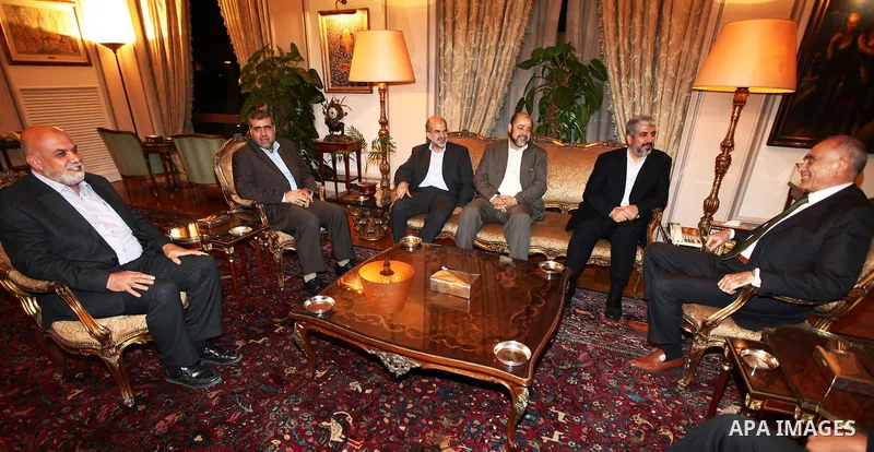 Palestinian Hamas leader Khaled Meshaal meets with the Minister of Foreign Affairs of Arab Republic of Egypt, Mohamed Kamel Amr, at the headquarters of the Foreign Ministry in Cairo on Aug. 17, 2011. Photo by Emad M Isht...