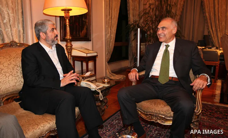 Palestinian Hamas leader Khaled Meshaal meets with the Minister of Foreign Affairs of Arab Republic of Egypt, Mohamed Kamel Amr, at the headquarters of the Foreign Ministry in Cairo on Aug. 17, 2011. Photo by Emad M Isht...