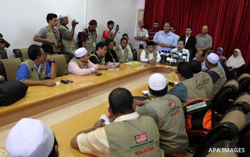 Member of the Palestinian Ministry of Health delivers speech during signing of an agreement with the Malaysian delegation, for the construction of Children's Hospital and Women in Gaza city on Aug. 18, 2011. Photo by Moh...