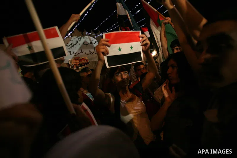 Dozens of Palestinians from Jerusalem protest in front of the Damascus Gate against the repression and massacres perpetrated by the Syrian regime against the Palestinian and Syrian people living in Syria, Jerusalem, on 1...