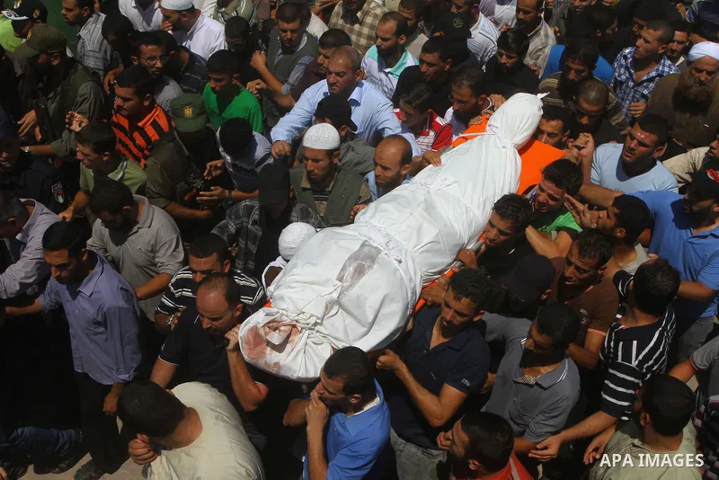 Palestinians carries the bodies of Kamal al-Nairab, the leader of an armed Palestinian faction, and other members during their funeral in Rafah in the southern Gaza Strip August 19, 2011. An Israeli air strike killed the...