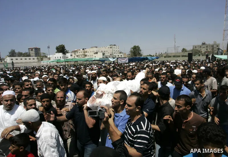 Palestinians attend the funeral of militant Kamal al-Nayrab, secretary-general of the Gaza-based group the Popular Resistance Committees (PRC) and five other people including a baby, killed in Israeli air strikes in the...