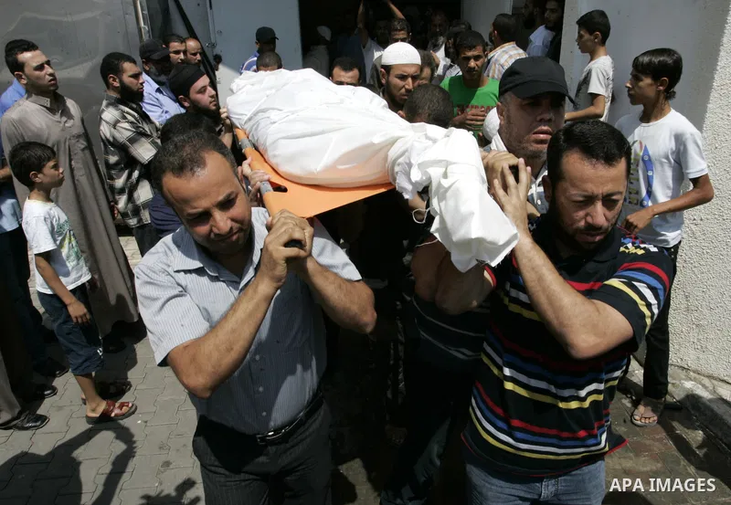 Palestinians attend the funeral of militant Kamal al-Nayrab, secretary-general of the Gaza-based group the Popular Resistance Committees (PRC) and five other people including a baby, killed in Israeli air strikes in the...