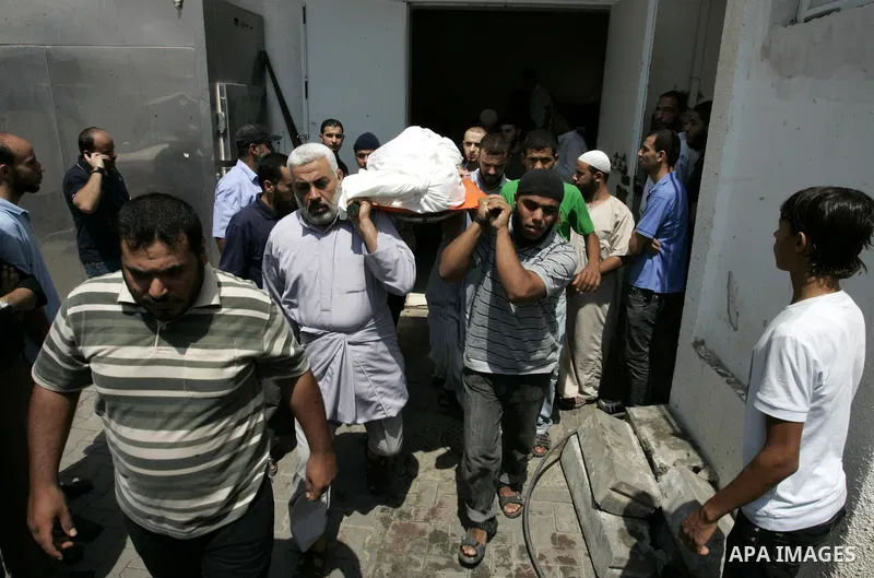 Palestinians attend the funeral of militant Kamal al-Nayrab, secretary-general of the Gaza-based group the Popular Resistance Committees (PRC) and five other people including a baby, killed in Israeli air strikes in the...