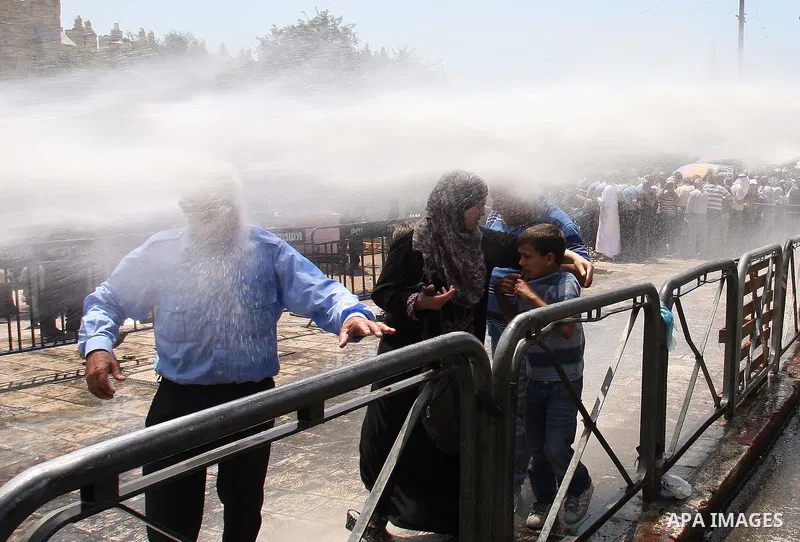 Israeli police uses a water canon to disperse a crowd of Palestinians outside Damascus Gate in Jerusalem's Old City Friday, Aug. 19, 2011. Dozens of Palestinians trying to reach the Al-Aqsa Mosque in Jerusalem for Muslim...
