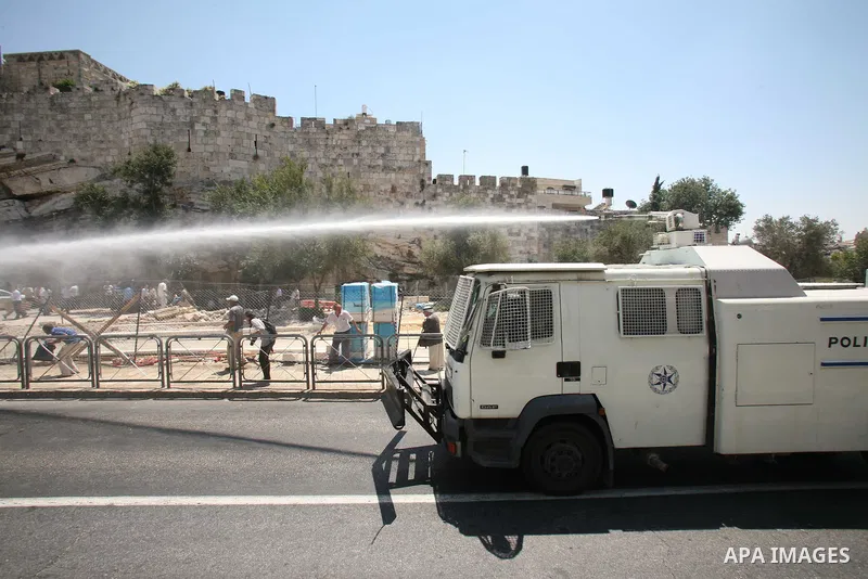 Israeli police uses a water canon to disperse a crowd of Palestinians outside Damascus Gate in Jerusalem's Old City Friday, Aug. 19, 2011. Dozens of Palestinians trying to reach the Al-Aqsa Mosque in Jerusalem for Muslim...