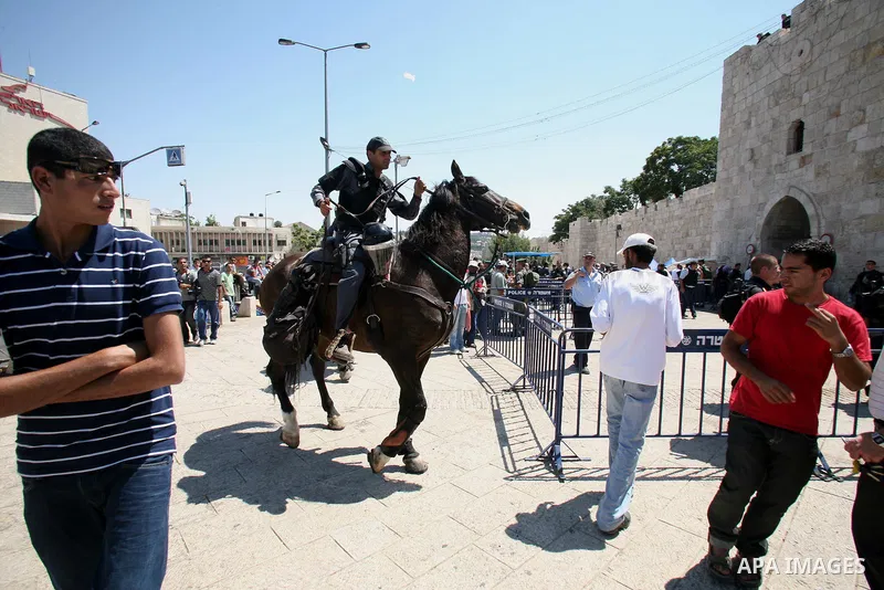 Muslim worshippers run away from Israeli mounted policemen after trying to cross a police barrier near Damascus Gate in Jerusalem's Old City during the third Friday of the holy month of Ramadan August 19, 2011. Israeli s...