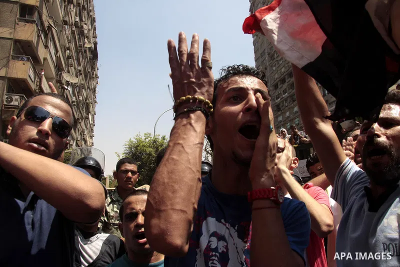 Egyptian protesters shout slogans against Israel during a protest in front of the Israeli Embassy in Cairo, on August 21, 2011. Egypt and Israel sought on Sunday to defuse a diplomatic crisis over the killing of five Egy...