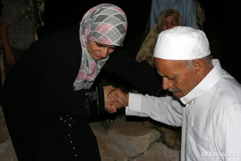 Palestinians mourn on their relatives, during the Israeli soldiers surround a neighbourhood during a military operation in the West Bank city of Hebron, early on 22 August 2011. Israel declared all-out war on Hamas, laun...