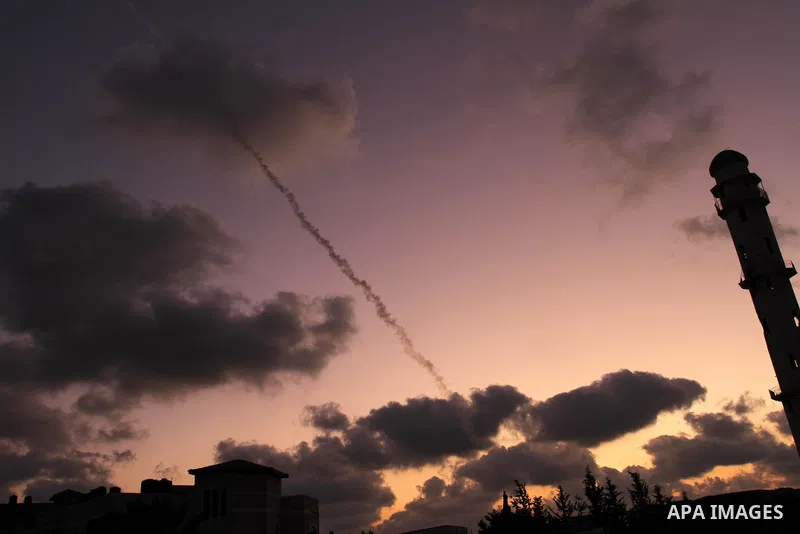A rocket is launched by Palestinian militants from the Gaza Strip toward Israel, in Gaza city on August 24,2011. Israeli air strikes killed a local commander of the Islamic Jihad militant group in the Gaza Strip and woun...