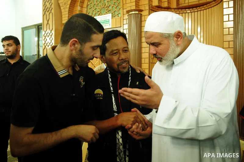 Palestinian Prime Minister in Gaza Strip, Ismail Haniya meets with a Malaysian delegation at mosque in Gaza city on August 24,2011. Photo by Ahmad Shaat