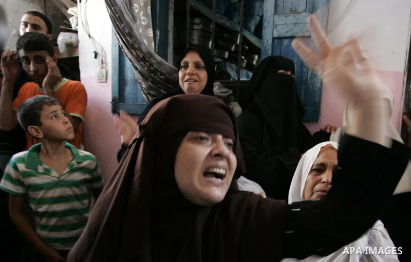 A relative of Palestinian Hisham Abu Harb mourns during his funeral in Rafah in the southern Gaza Strip on August 25, 2011. A days-old truce announced by Gaza militants appeared to be fast unravelling after 24 hours of a...