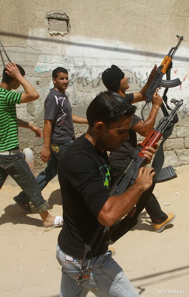 Palestinian militants of Islamic Jihad militant take part in the funeral of Atteya Mqat, in Gaza City on Aug. 25, 201. Mqat was killed early Wednesday in Israeli airstrike in Gaza. Photo by Ashraf Amra