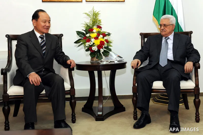 Palestinian President Mahmoud Abbas (Abu Mazen) meets with the Chinese envoy to the peace process in the Middle East, Woseeka in West Bank city of Ramallah on August 25, 2011. Photo by Mufeed Abu Hasnah