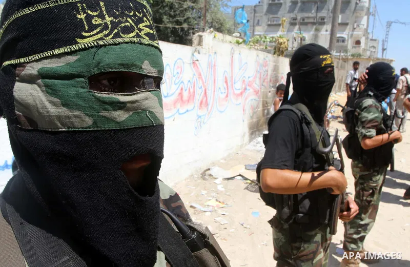 Palestinian militants of Islamic Jihad take part in the funeral of Alaa Hamdan and Saleem al-Arabid in Gaza City on August, 26,2011 after Palestinian groups in the Gaza Strip agreed on a new ceasefire after days of deadl...