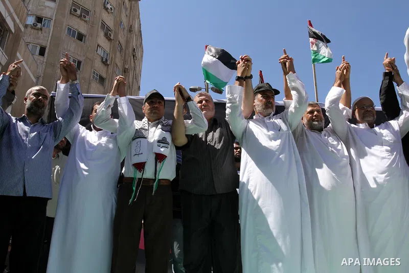 Palestinians take part in a protest as they mark Quds Day or Jerusalem Day in Gaza city, Friday, Aug. 26, 2011. The late Iranian leader Ayatollah Khomeni declared the last Friday of the Islamic fasting month of Ramadan a...