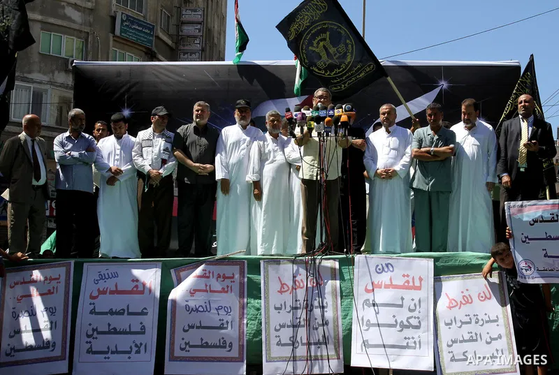 Palestinians take part in a protest as they mark Quds Day or Jerusalem Day in Gaza city, Friday, Aug. 26, 2011. The late Iranian leader Ayatollah Khomeni declared the last Friday of the Islamic fasting month of Ramadan a...