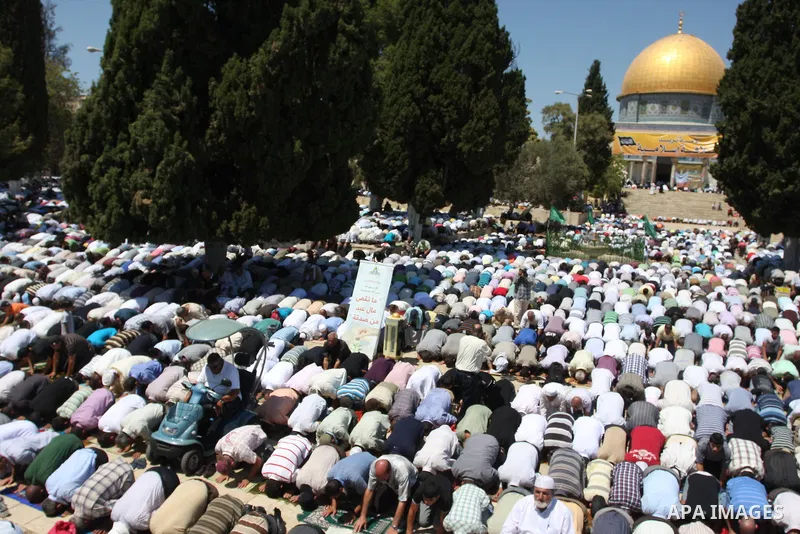 Palestinians gather for prayers at the Al Aqsa Mosque in Jerusalem, on the last Friday of the Muslim holy month of Ramadan, August 26, 2011. Muslims around the world are observing the holy fasting month of Ramadan where...