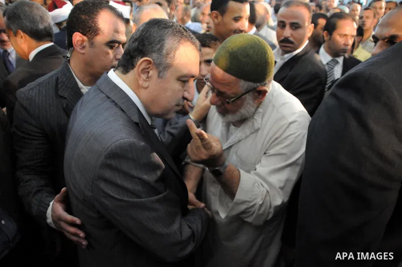 Egyptian Prime Minister, Essam Sharaf attends the last Friday prayers of the holy month Ramadan at a mosque in Cairo on August 26,2011. Egyptian security has been boosted around the Israeli embassy ahead of a protest whi...