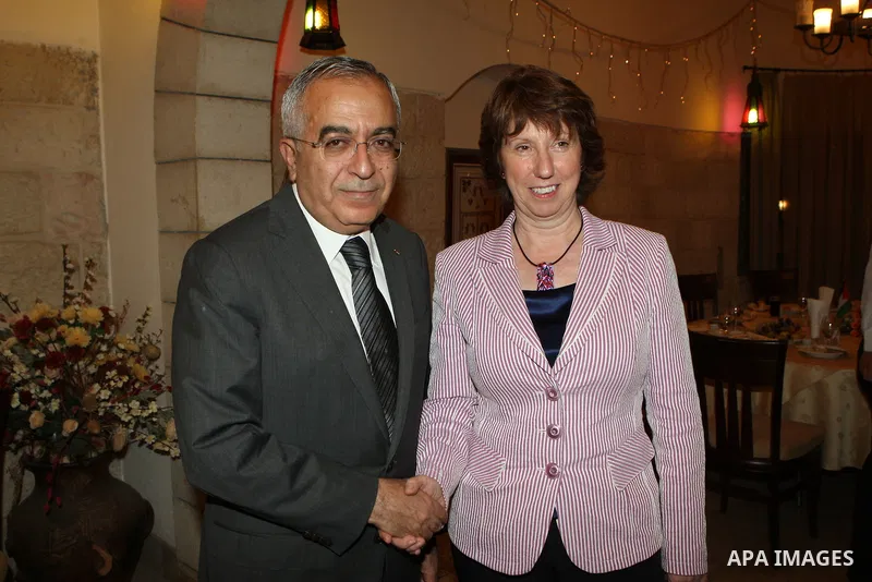 Palestinian Prime Minister Salam Fayyad, meets with Atherine Ashton EU Commissioner in the West Bank city of Ramallah on August 27, 2011. Photo by Mustafa Abu Dayeh