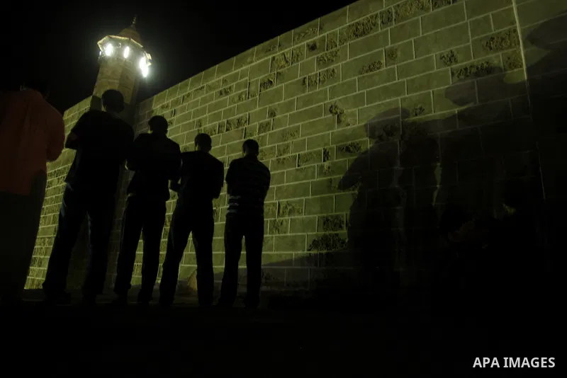 Palestinian Muslim worshippers pray during Laylat Al Qadr prayers on the 27th day of the holy fasting month of Ramadan in main mosque of Al Emari in Gaza City, Friday, Aug. 27, 2011. Laylat Al Qadr, the most important pr...