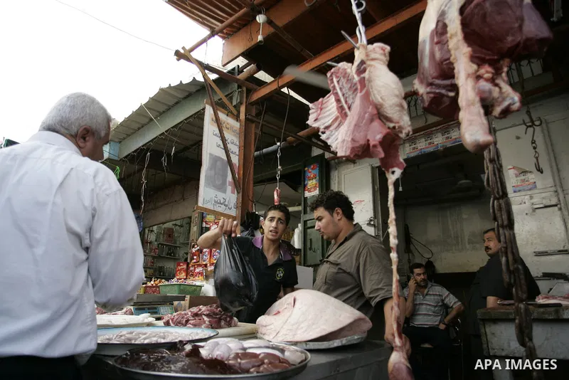 Palestinians shop for food as Muslims shop ahead of the Eid al-Fitr celebrations in Rafah, southern Gaza Strip on Aug. 28, 2011. Muslims in the region will celebrate the Eid al-Fitr holiday starting with the sighting of...